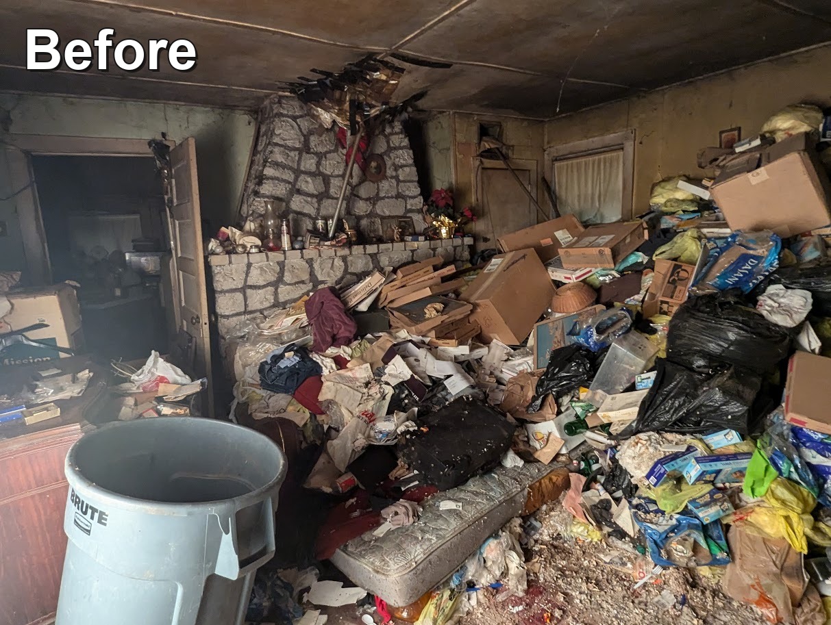 Fireplace room before hoarder cleanout